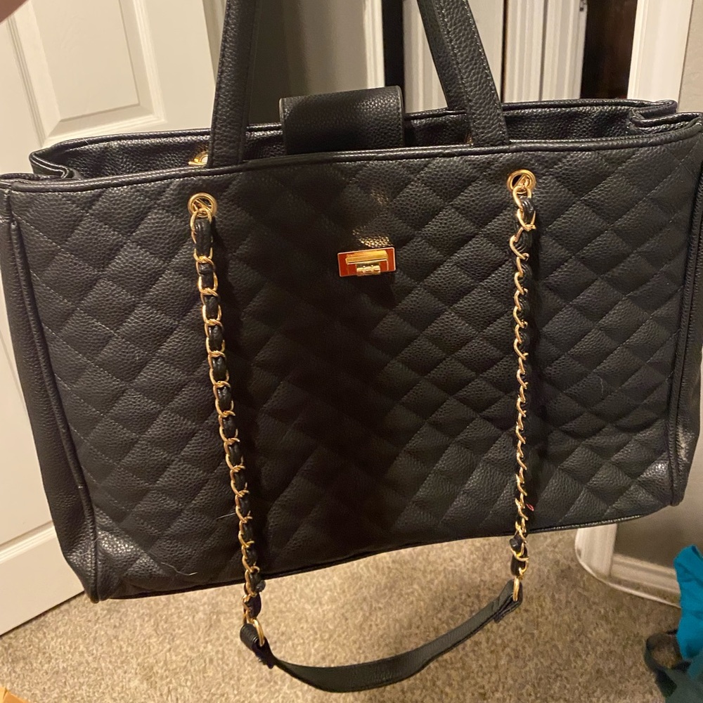 Large black quilted tote handbag